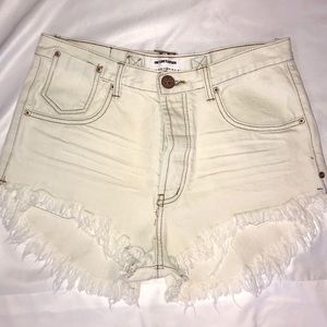 Mid Length white shorts